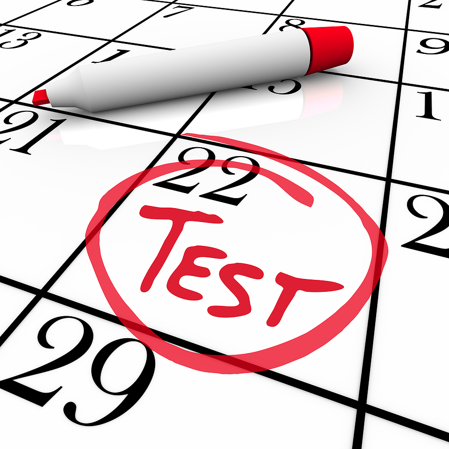 a calendar with a test scheduled and circled in red