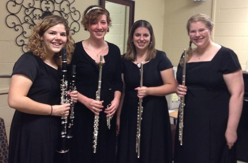 My old roommates, Angela Christenson (clarinet), Marisa Sweney (flute), Sarah Kohrs (flute) and I pose together with our instruments before a concert. 