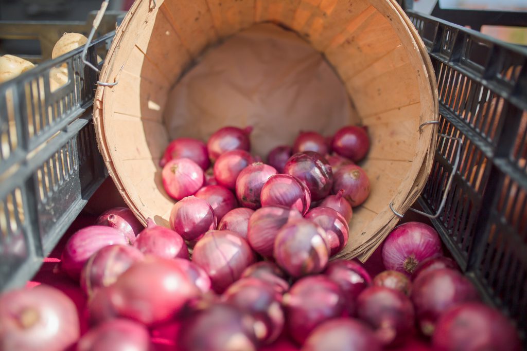 Red onions for sale at the Winona Farmer's Market.