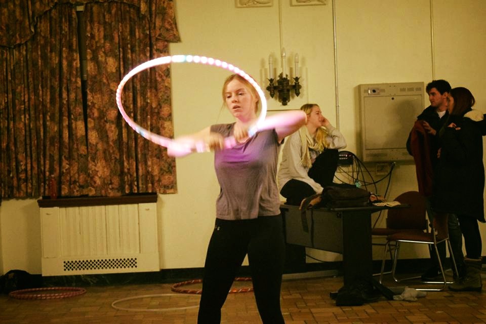 WSU student hula hooping for a club on campus.