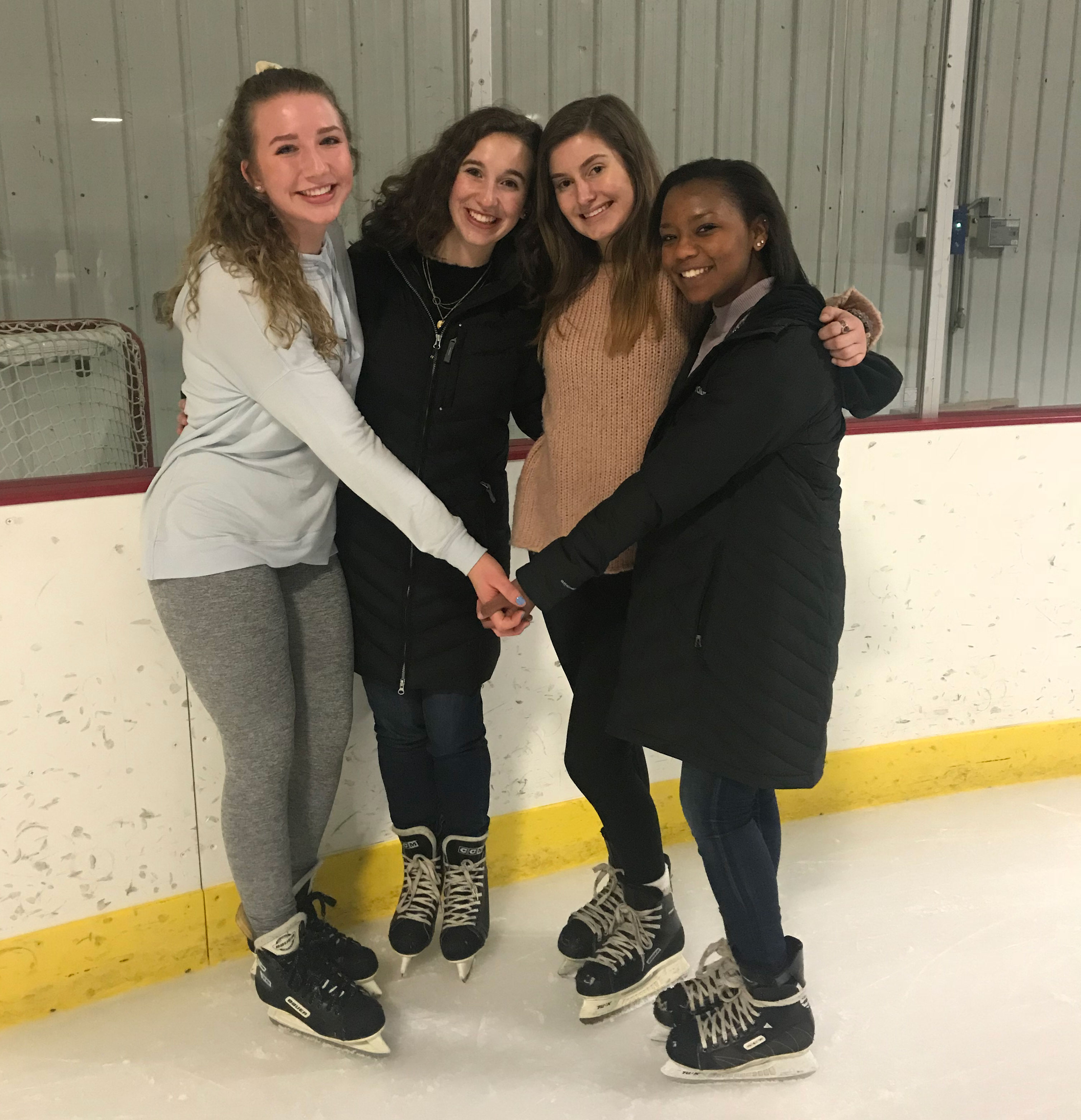 Janae ice skating with her friends.