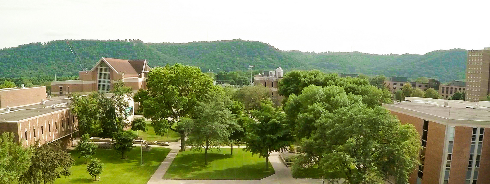 Campus-Aerial-Summer-Bluffs-1920