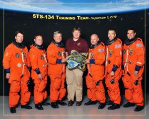 Brian From with the crew for the last mission of Space Shuttle Endeavor. The WSU physics graduate trained this crew and most of the others manning Endeavor missions.