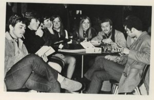 Students Smoking Around Table