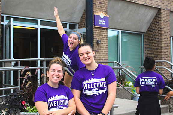 Three members of the welcome week move-in crew.