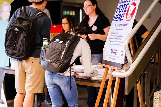 A student registering to vote on campus.