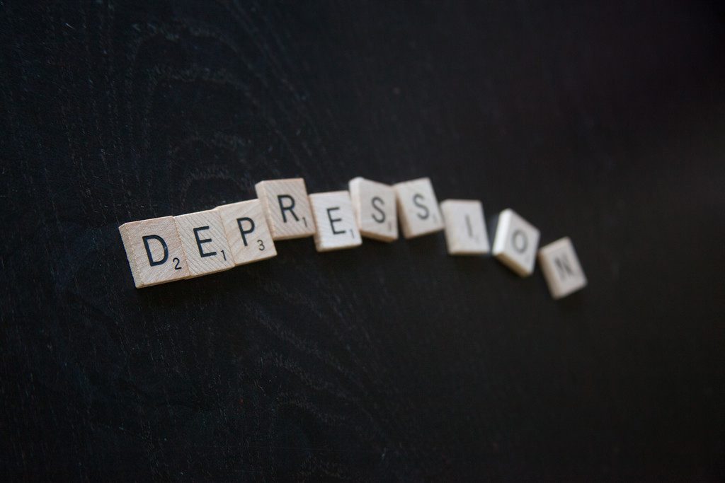 Depression spelled out in Scrabble pieces.